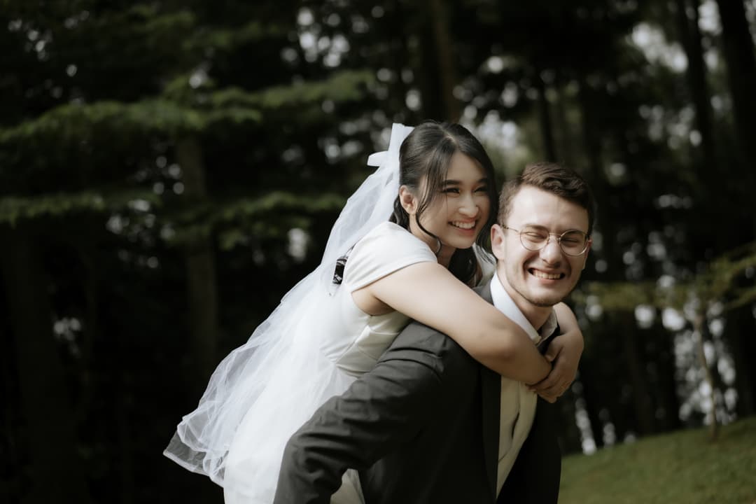 Pre-wedding piggyback portrait of Bintan and Okan