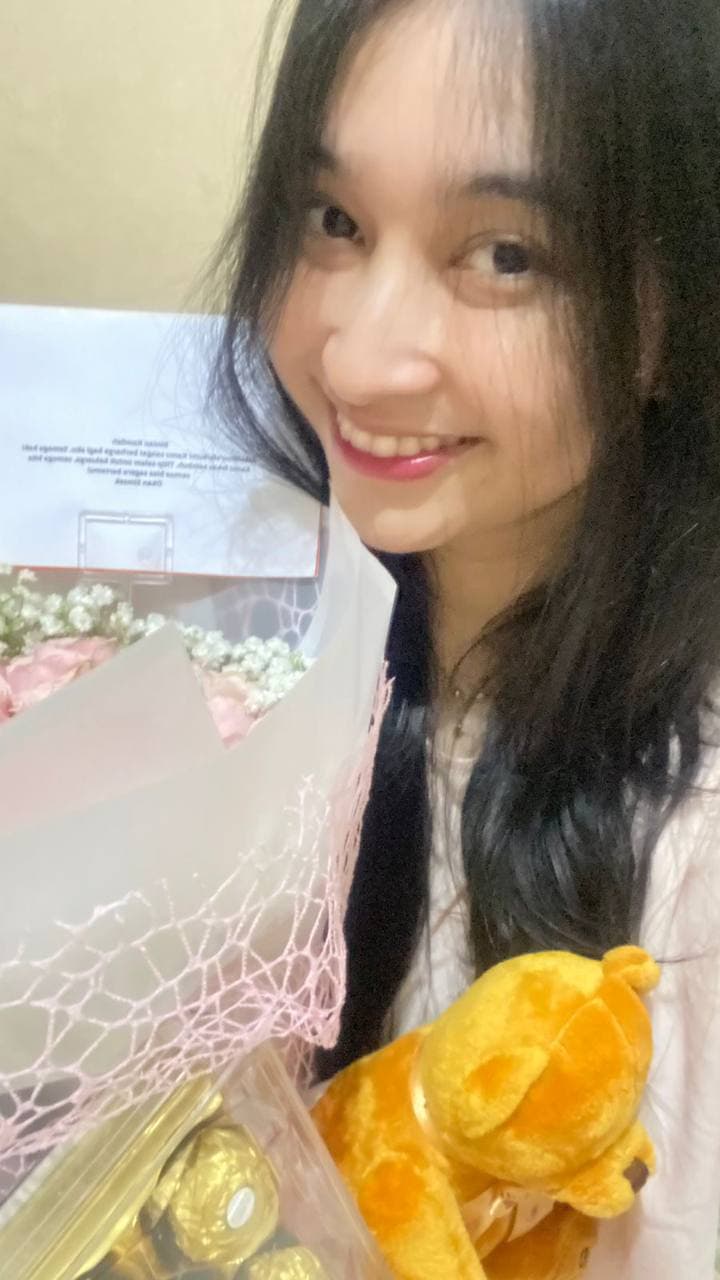 Bintan with her first flower from Okan